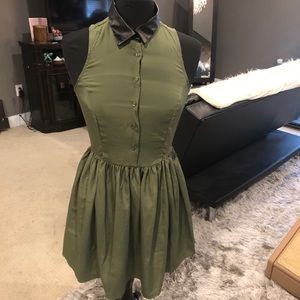 Green dress with black faux leather collar
